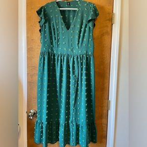 Green polkadotted dress